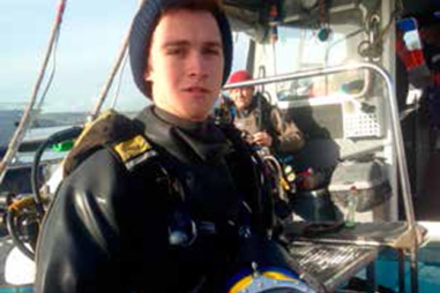 Ocean Sciences graduate, Jake Davies on a boat