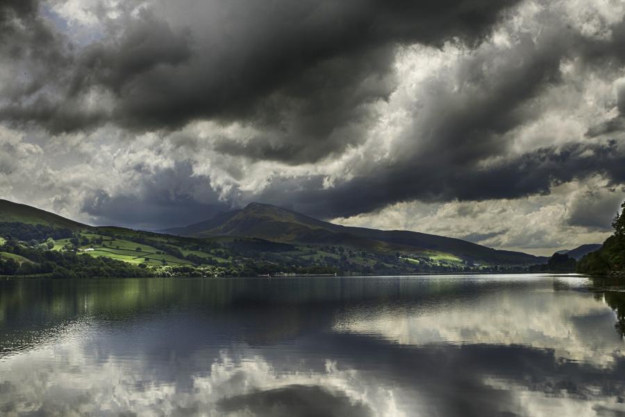 Llyn Tegid under an atmospheric cloudy sky