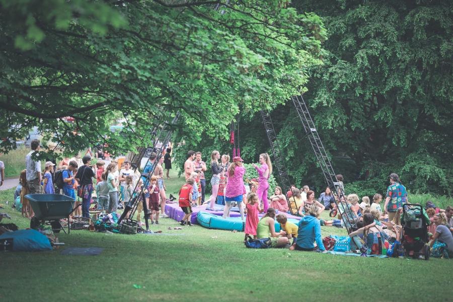 People in a festival in a field
