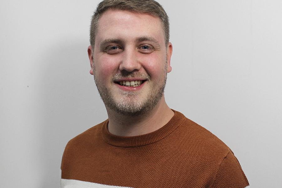 Jonathan Cliffe smiling and looking at the camera
