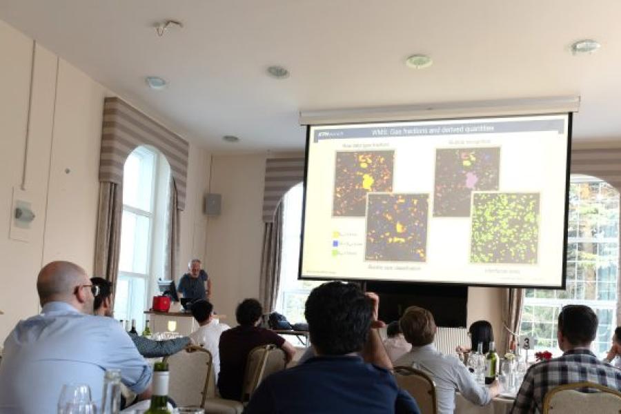 Delegates listening to Prof. em Horst-Michael Prasser's speech during the dinner reception. (15.06.2023)