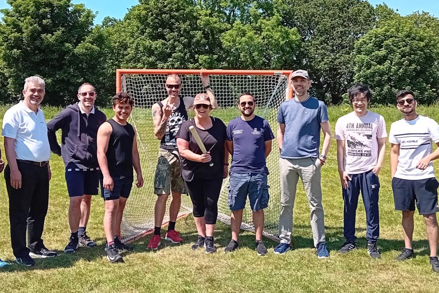 Staff and students at the School of computer Science and engineering playing rounders