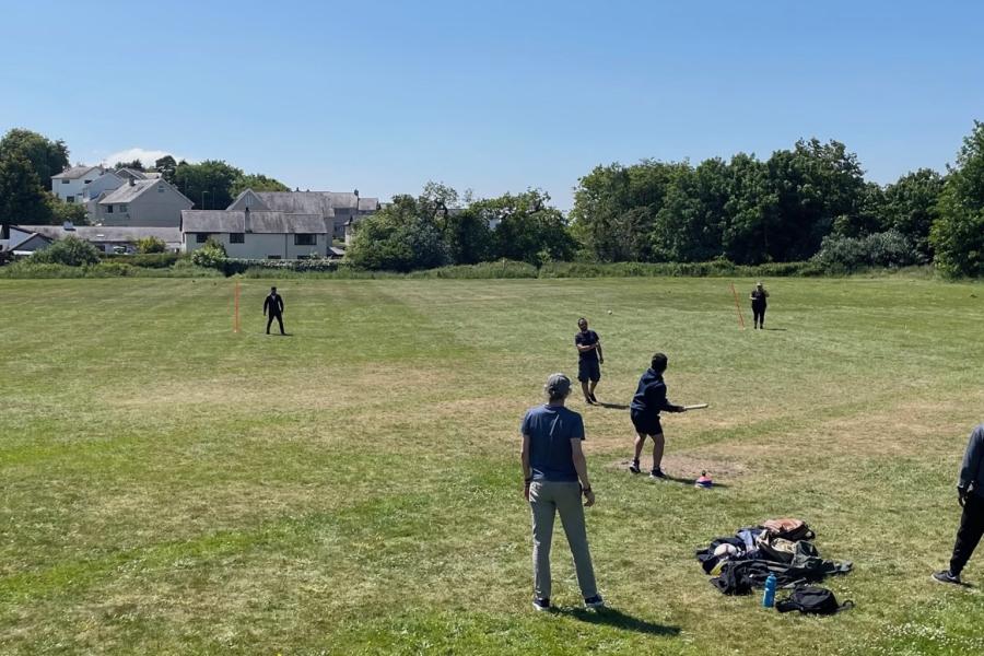 Staff and students at the School of computer Science and engineering playing rounders