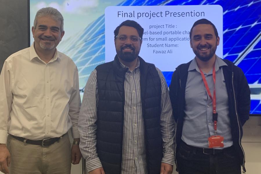 Student Fawaz Ali (middle) with academics, Mohammed Madbrook (left) and Daniel Roberts (right)