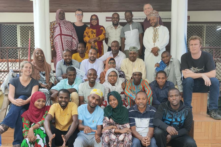 Groupl of people sat posing for a picture