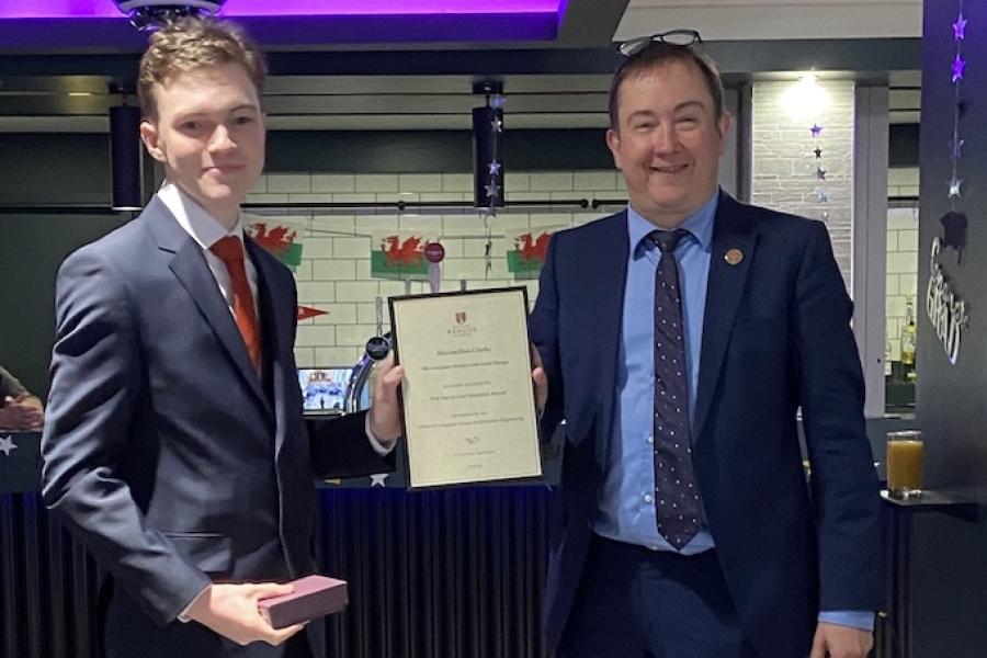 Maximillian Clarke receiving his award from Dr Iestyn Pierce (Head of School)