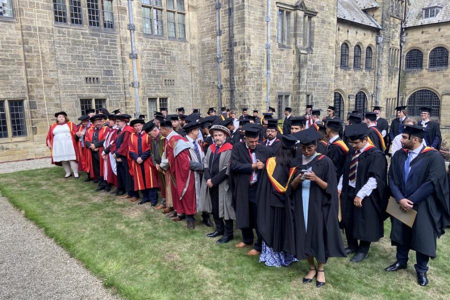 Academics waiting for the photograph