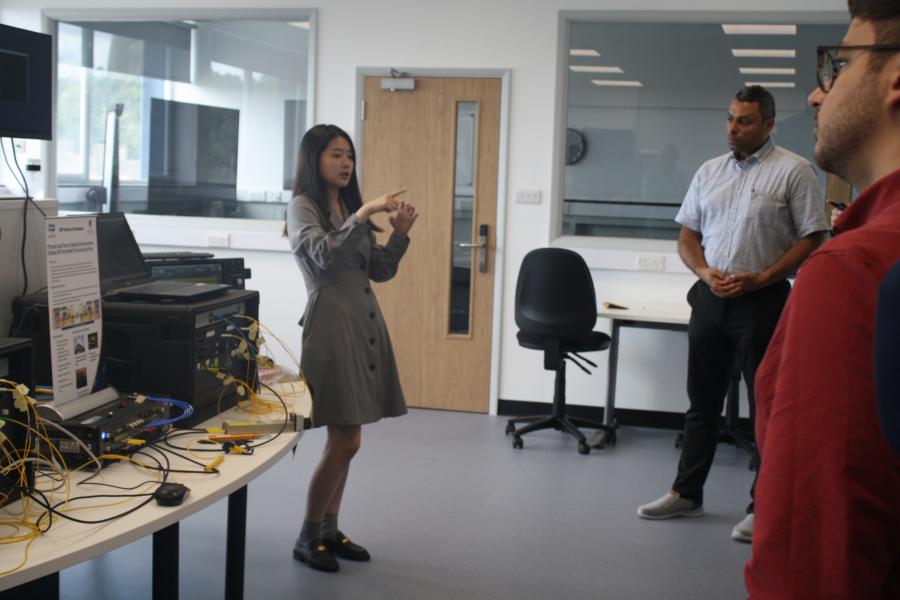 woman in lab doing demonstration