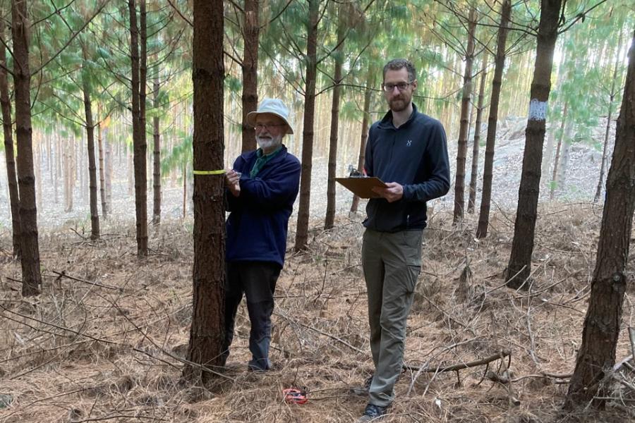 Prof. Julian Evans and his son in woodland