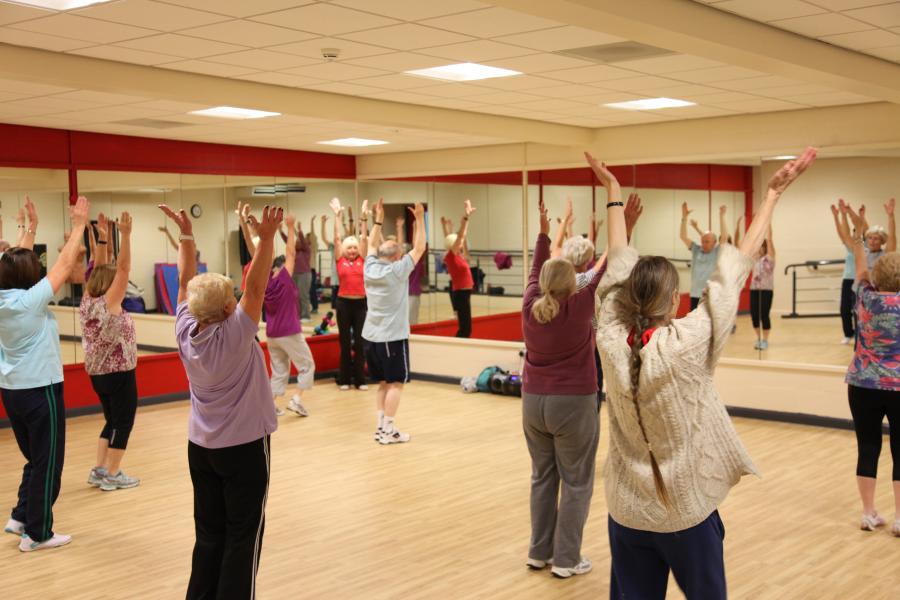 group of over 50's enjoying an exercise class