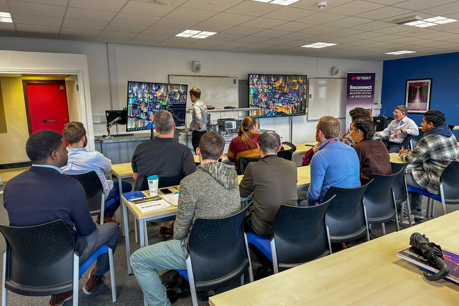 A seminar room with students and member from industry listening