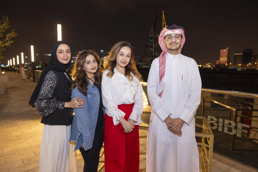 Four alumni at Bahrain reunion