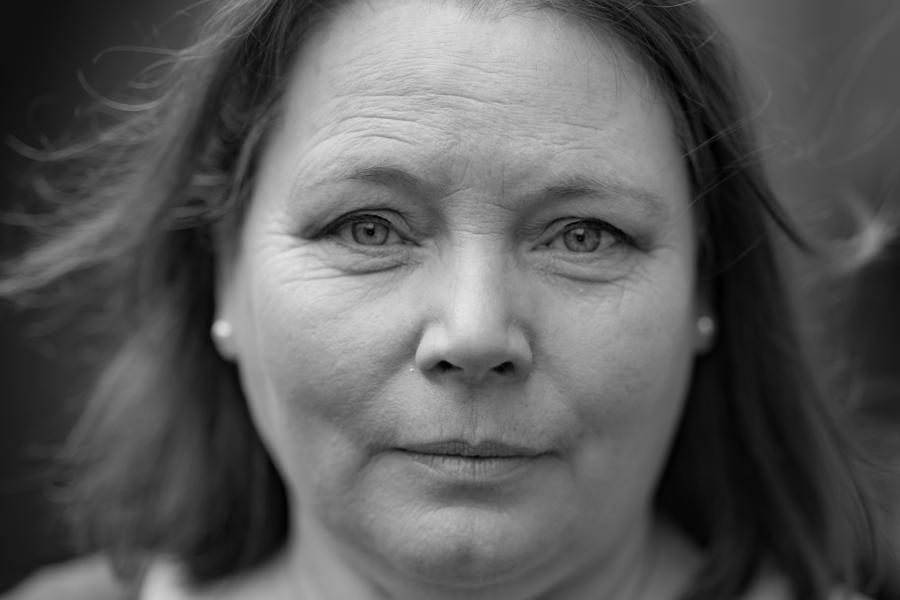  Black and white image of woman looking to camera