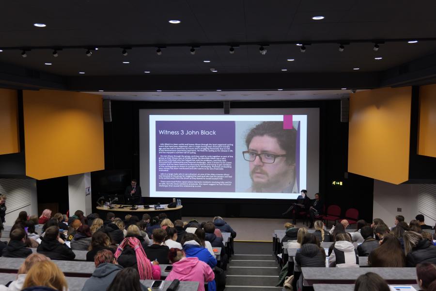 Students looking at a presentation