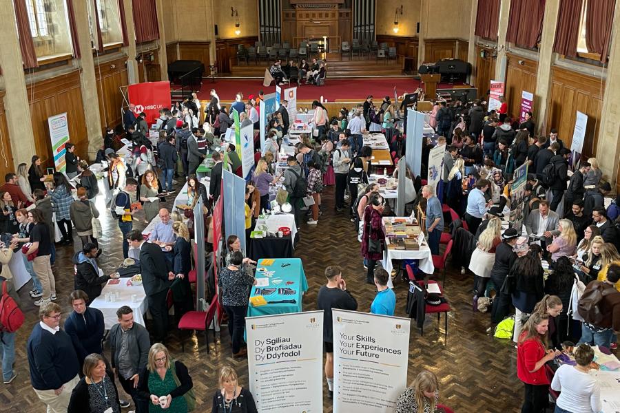 Careers Fair in a large hall with a large number of people