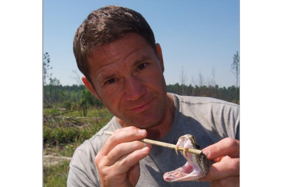 Steve Backshall showing the snake teeth