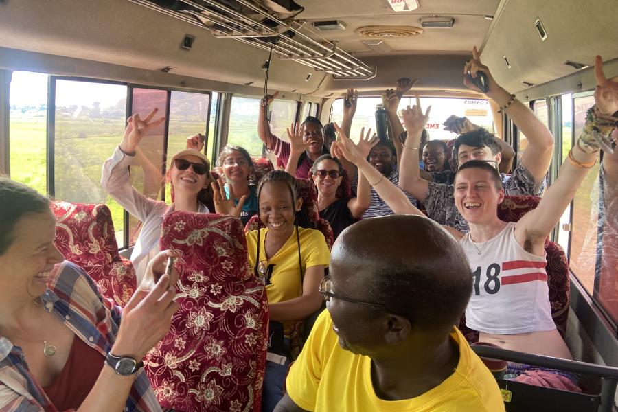 Singing on the bus between field sites during the Uganda study tour