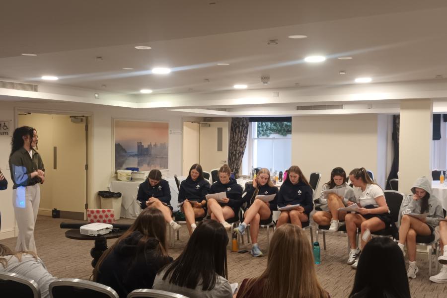 A room of young women taking part in a player welfare clinics at the U18 Six Nations in Colwyn Bay