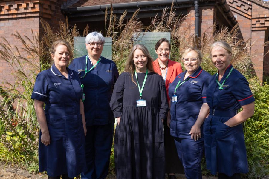  a group of 6 women, some of whom are in nursing uniforms