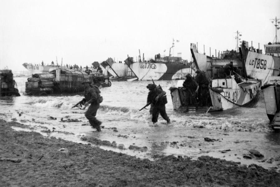 Commandos are seen here wading ashore from landing craft, onto the beaches of Normandy, June 1944. On 6 June 1944, around 4,300 Allied personnel lost their lives serving their country in what would be the largest amphibious invasion ever launched. This year marks the 70th anniversary of the Normandy Landings, centred around the date of invasion, 6 June, known as “D-Day”.
