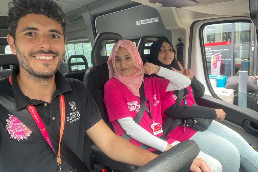 Student Support Staff in a mini bus