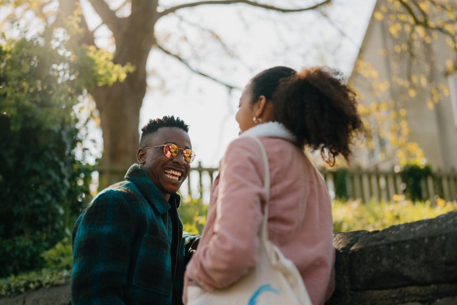 students chatting oustide university