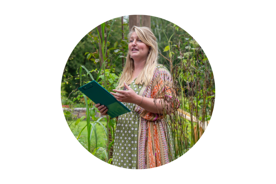 Picture of Natalie Chivers standing in Treborth Garden making a speech