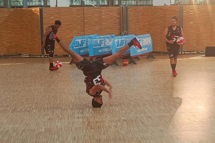 3 Basketball players 1 breakdancing