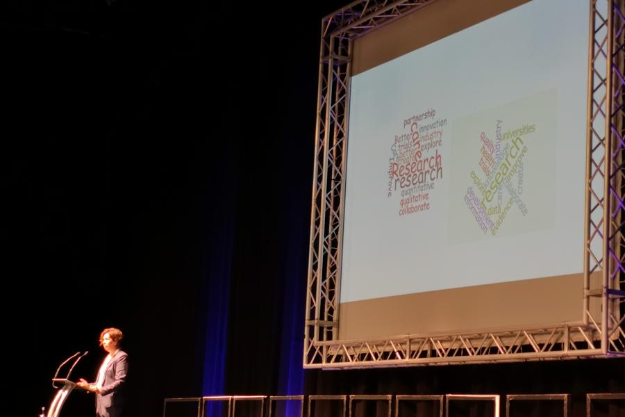 Man giving a presentation at a conference