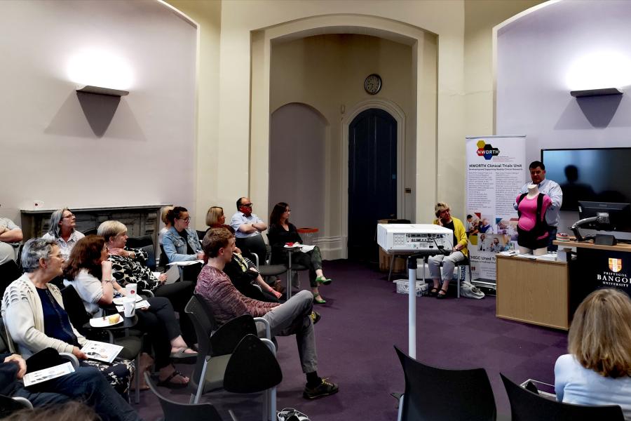 People sat listening to a seminar