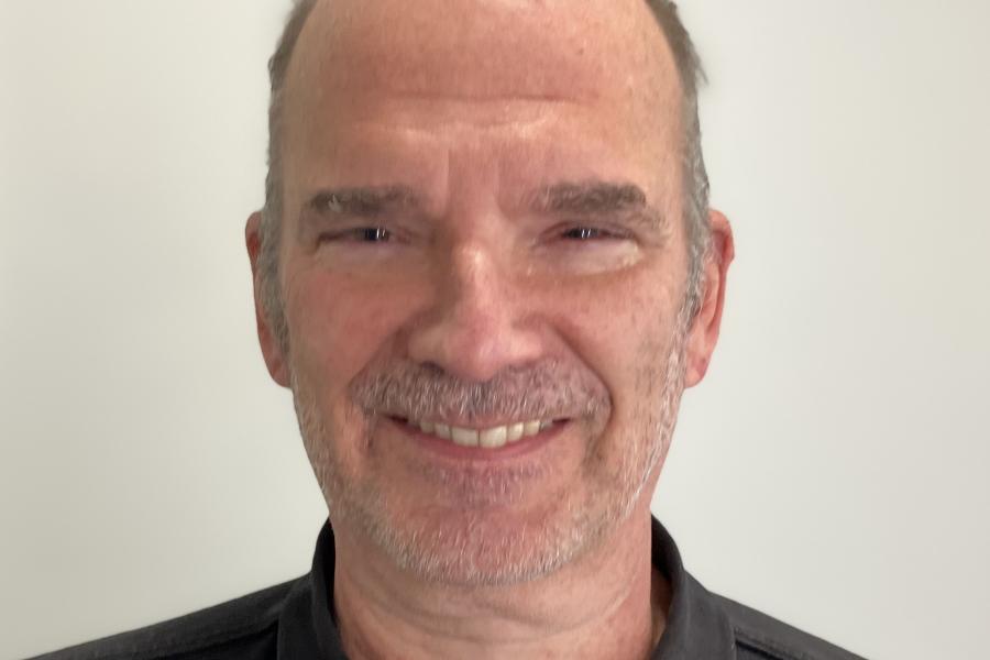 Head and shoulder photo of Prof. Rob Ward wearing black shirt