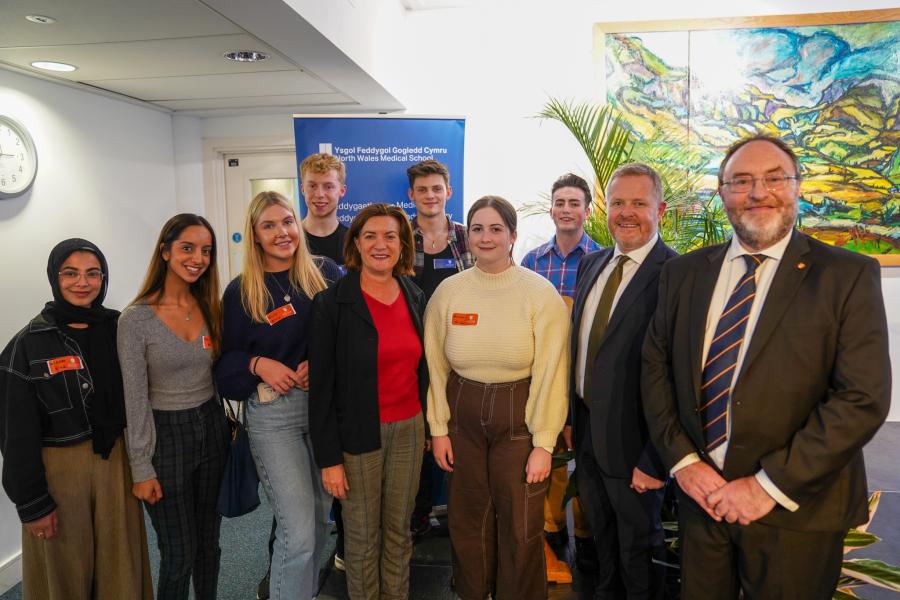 First Minister Eluned Morgan with Jeremy Miles MS, Professor Edmund Burke and Bangor Medical students