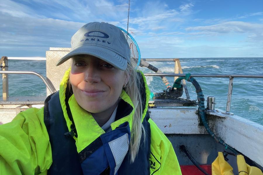 Charlie Heney onboard a fishing vessel collecting scientific data on European Lobster stocks