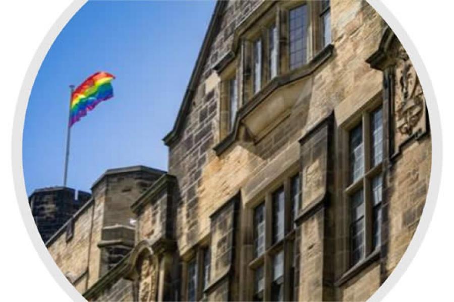 LGBTQ+ Flag Flying Above Main Arts Building