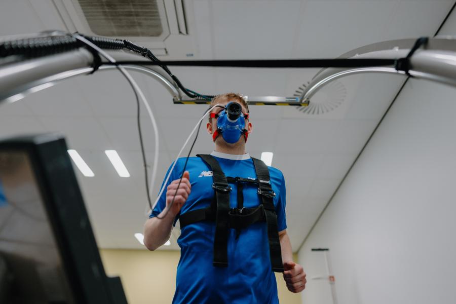 Student wearing Endurance Performance Testing gear in the lab at Bangor University