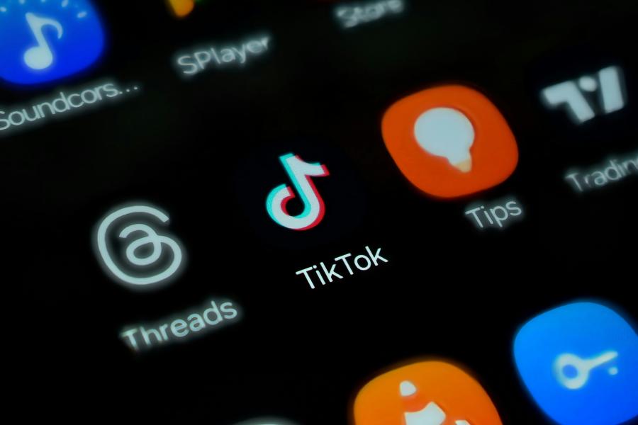 Image of apps on phone including Tiktok app