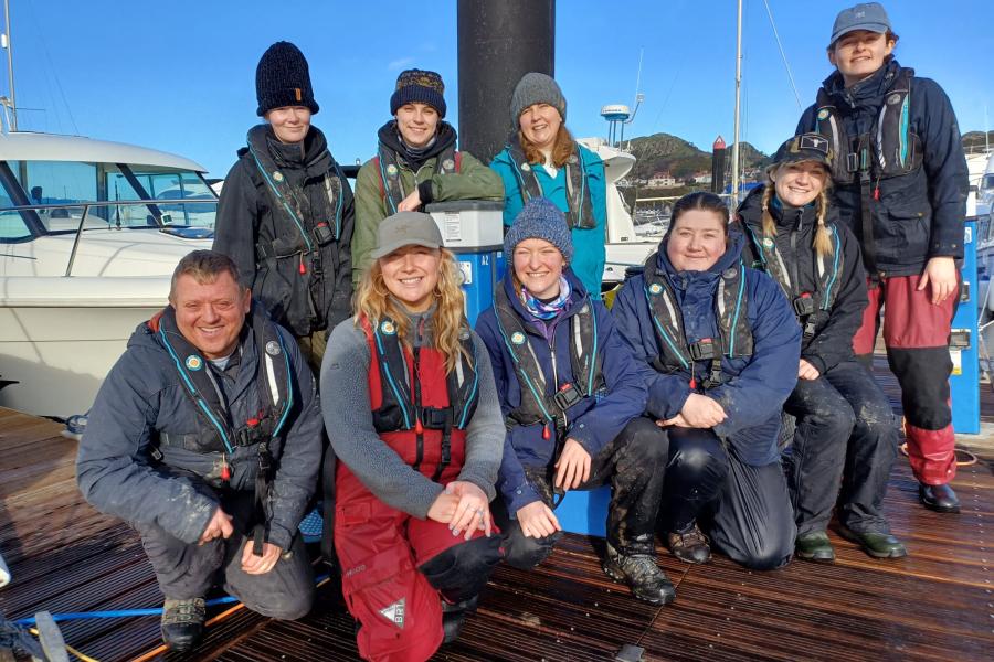 Wild Oysters volunteers group photo at Conwy Marina, supporting oyster nursery monitoring activities