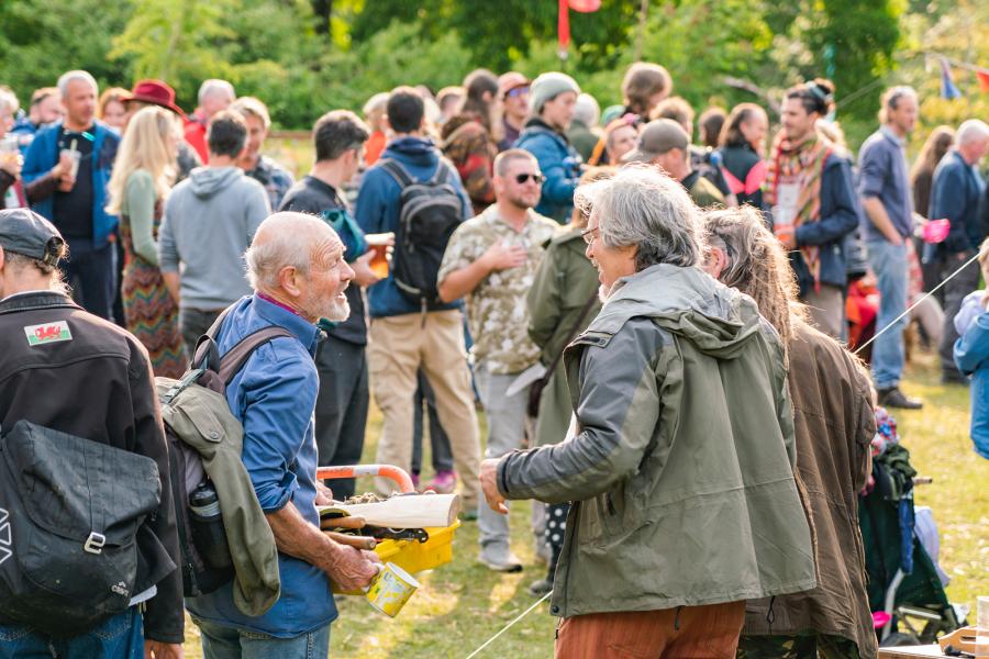 People in a field in a festival