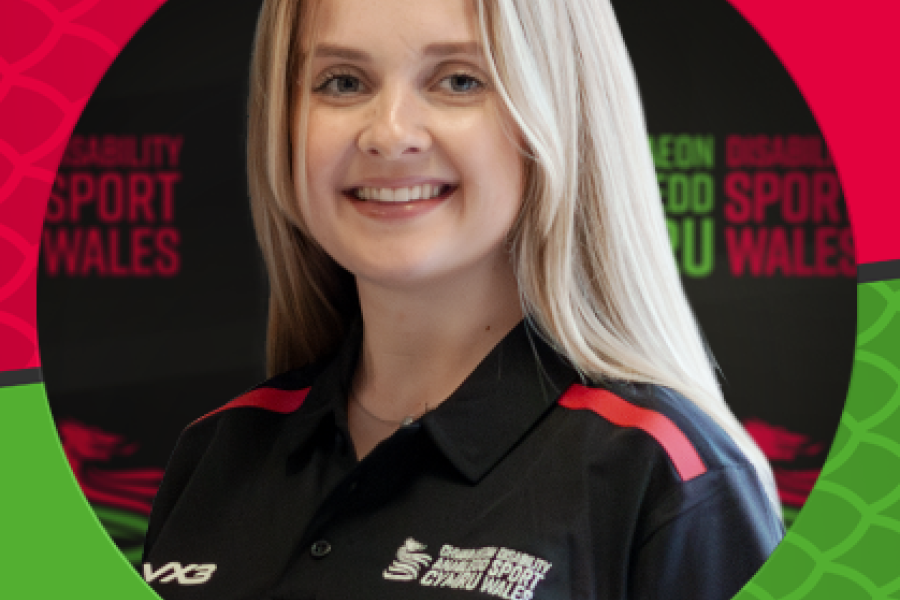 Professional photo of head and shoulder Libby Steele with hair down wearing a Disability Sport Wales uniform