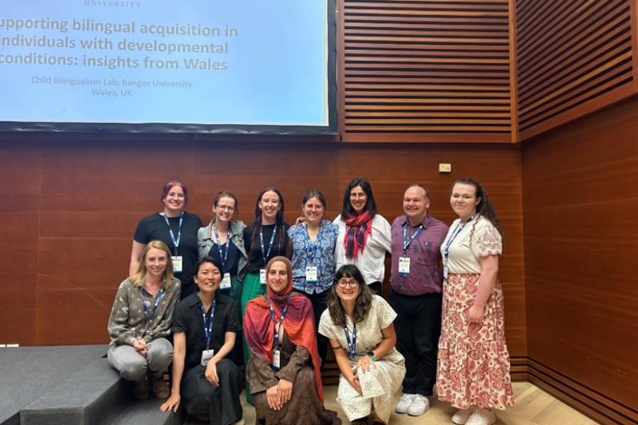 1)	Postgraduate researchers presenting their research at academic conferences and developing their professional networks