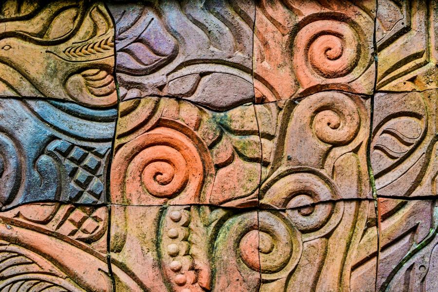 Stone carved artwork painted