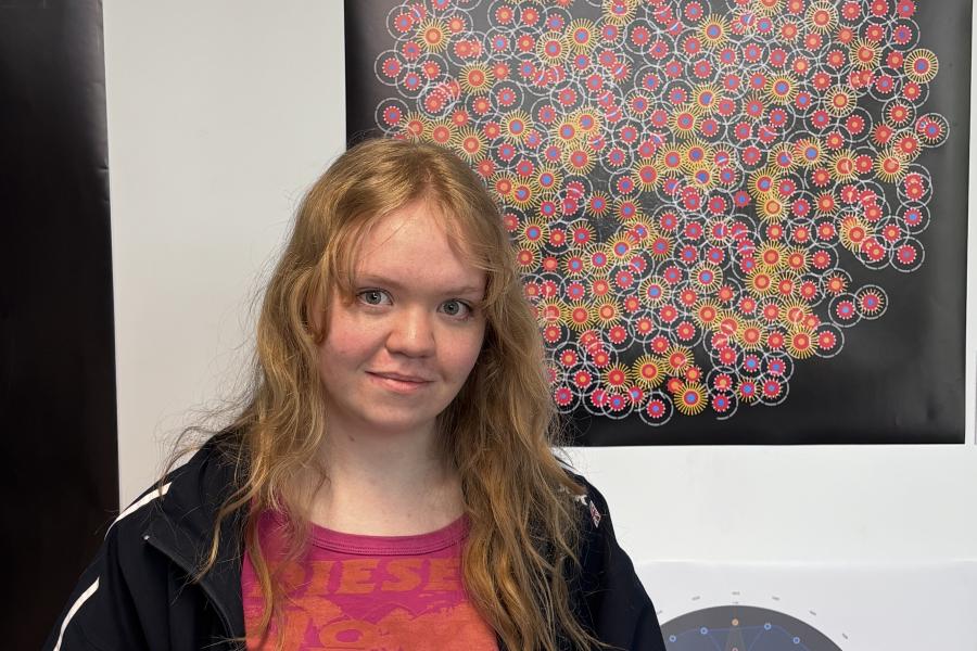 Runner-up honours were awarded jointly to:  Isabel Thomason for A Year in Weather. Isabel receiving her prize.