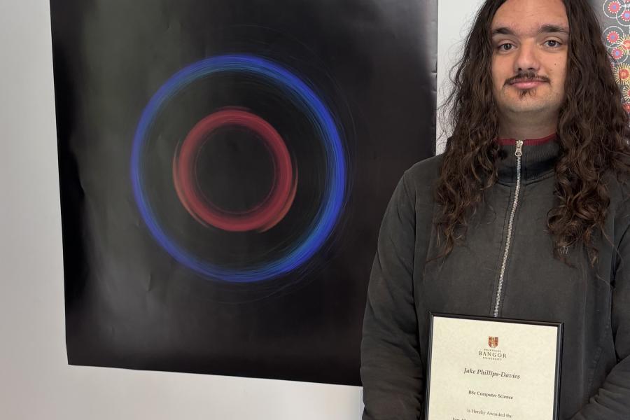 Best in Show was awarded to Jake Phillips-Davies for Our Solar System in its Smaller Bodies. Jake receiving his prize.