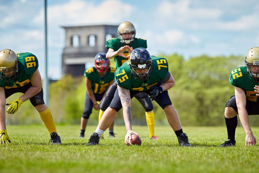 Students playing American Football