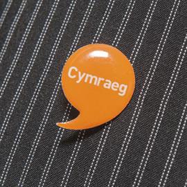 Iaith Gwaith badge 