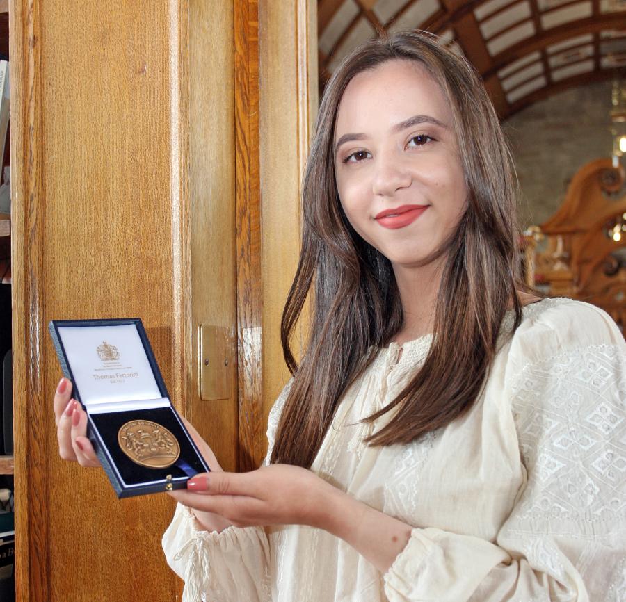 Veronica Diveica with her bronze medal from the Drapers