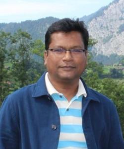 a portrait image of Dr Atiqur-Khan