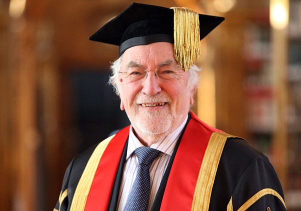 Photo of Sir Robin, the University's Chancellor, in Bangor Graduation robes
