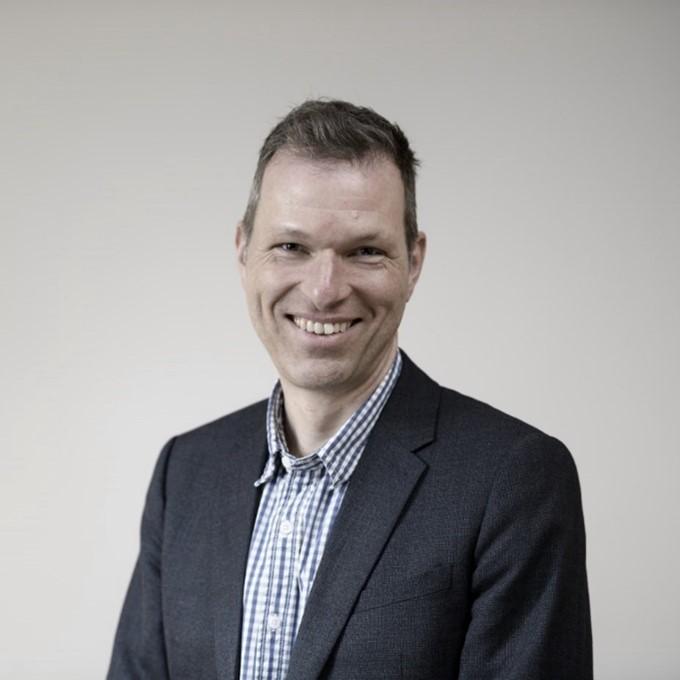 A headshot of Dr Chris Subbe