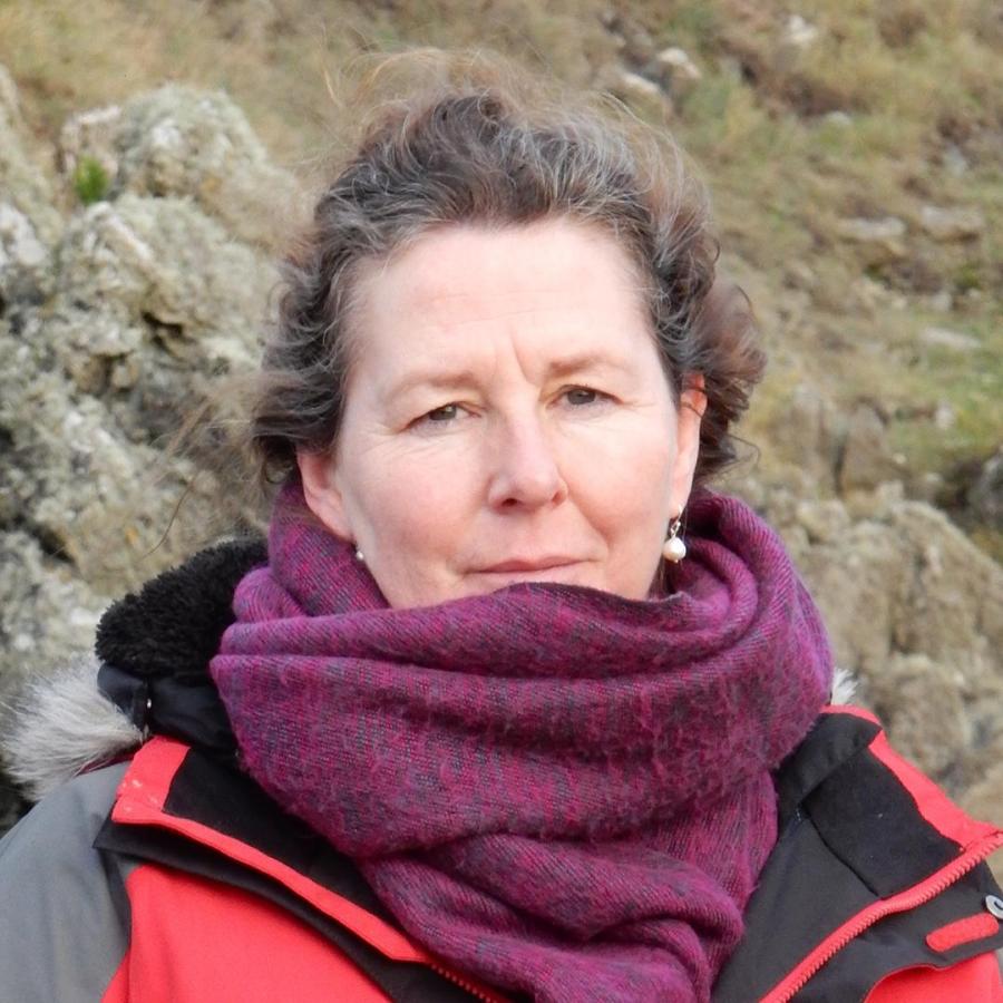woman wrapped in large scarf
